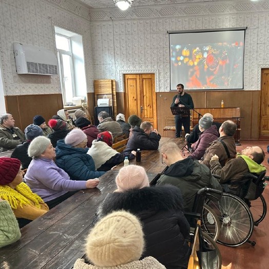 Treffen mit Witwen und Invaliden in Uman